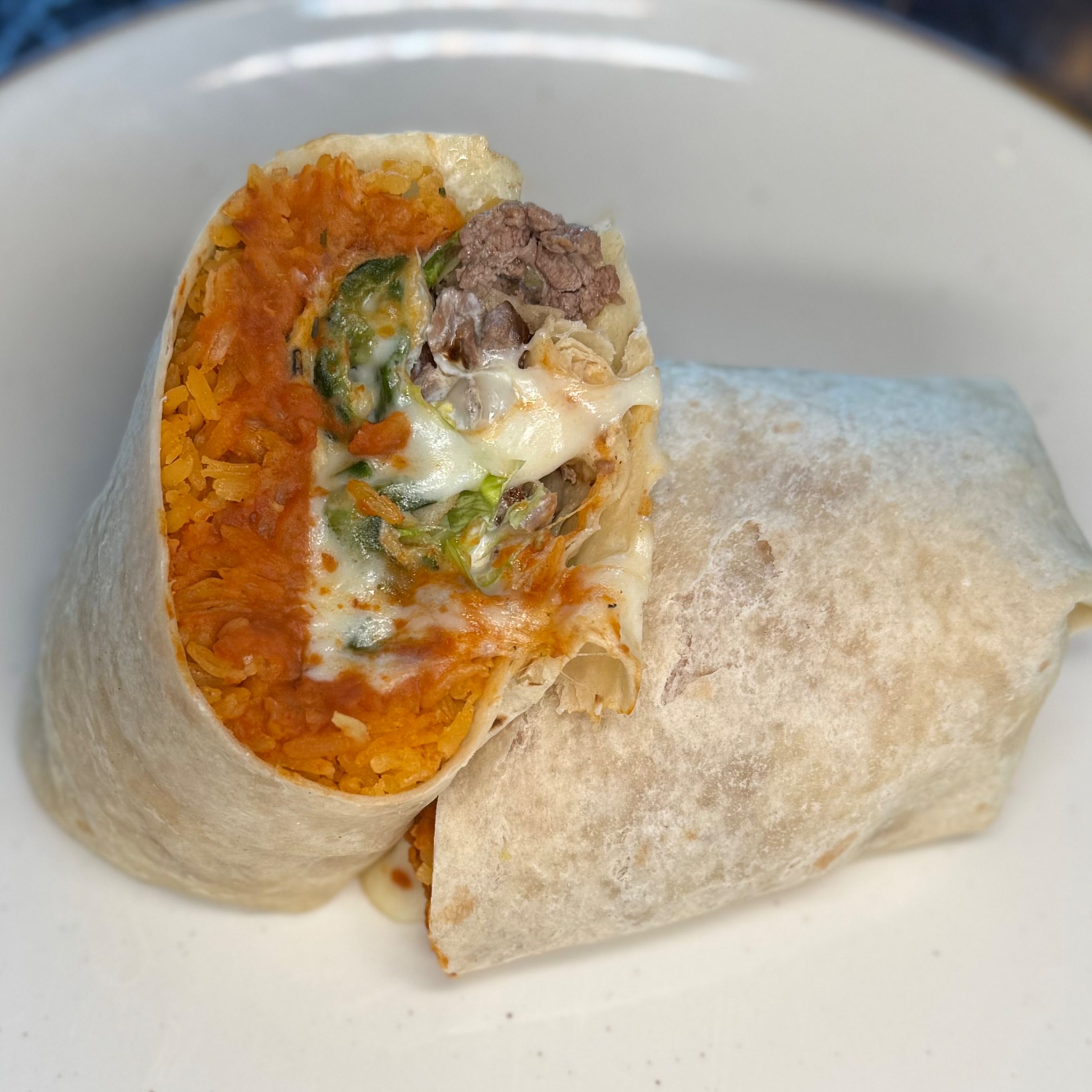 Chile Relleno Burrito con Carne Asada.